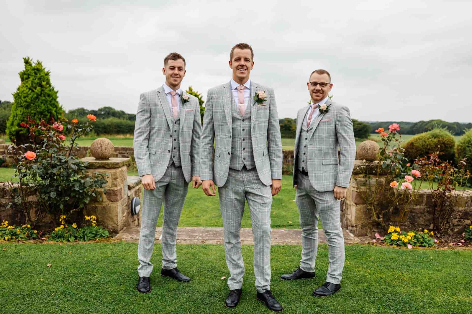 grooms ment Beeston manoir wedding suits flowers