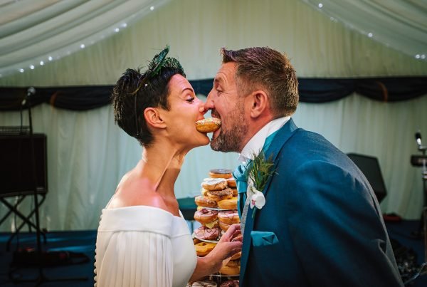 The Woodman inn West Yorkshire bride wedding groom donuts kiss