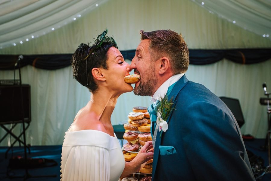 The Woodman inn West Yorkshire bride wedding groom donuts kiss