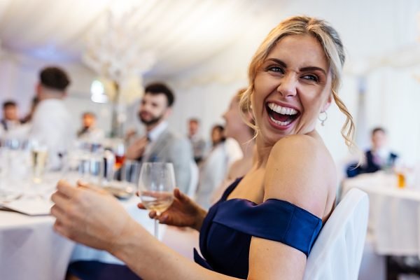 bridesmaid laughter smiles family wedding photography