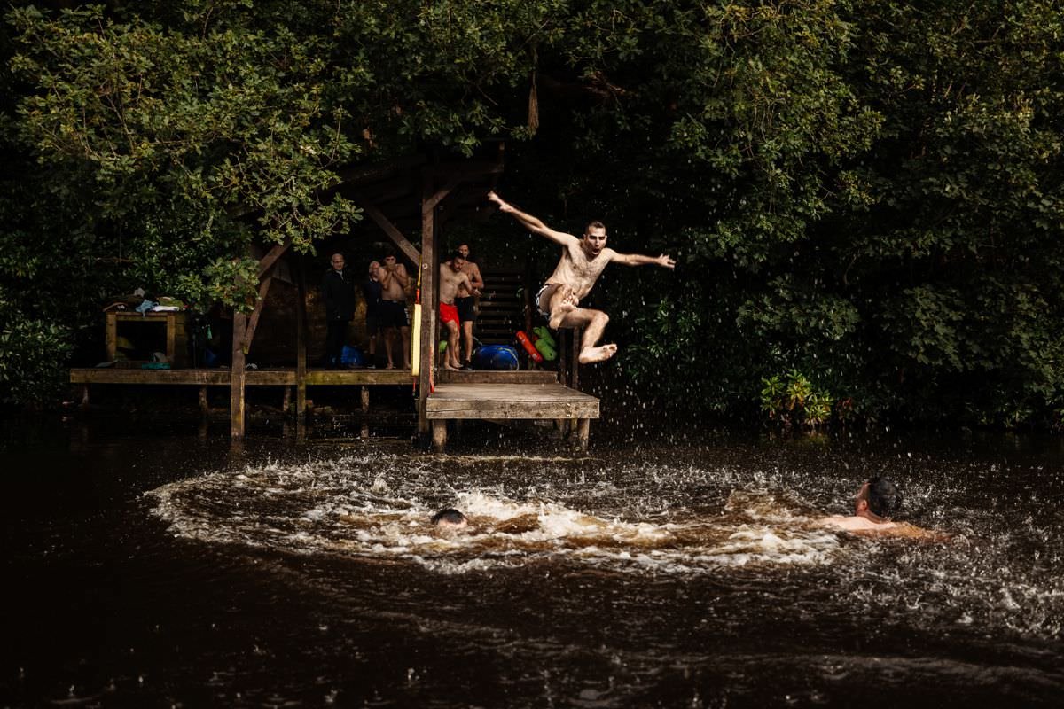 batsmen jumping in lake wyresdale park wedding photography 