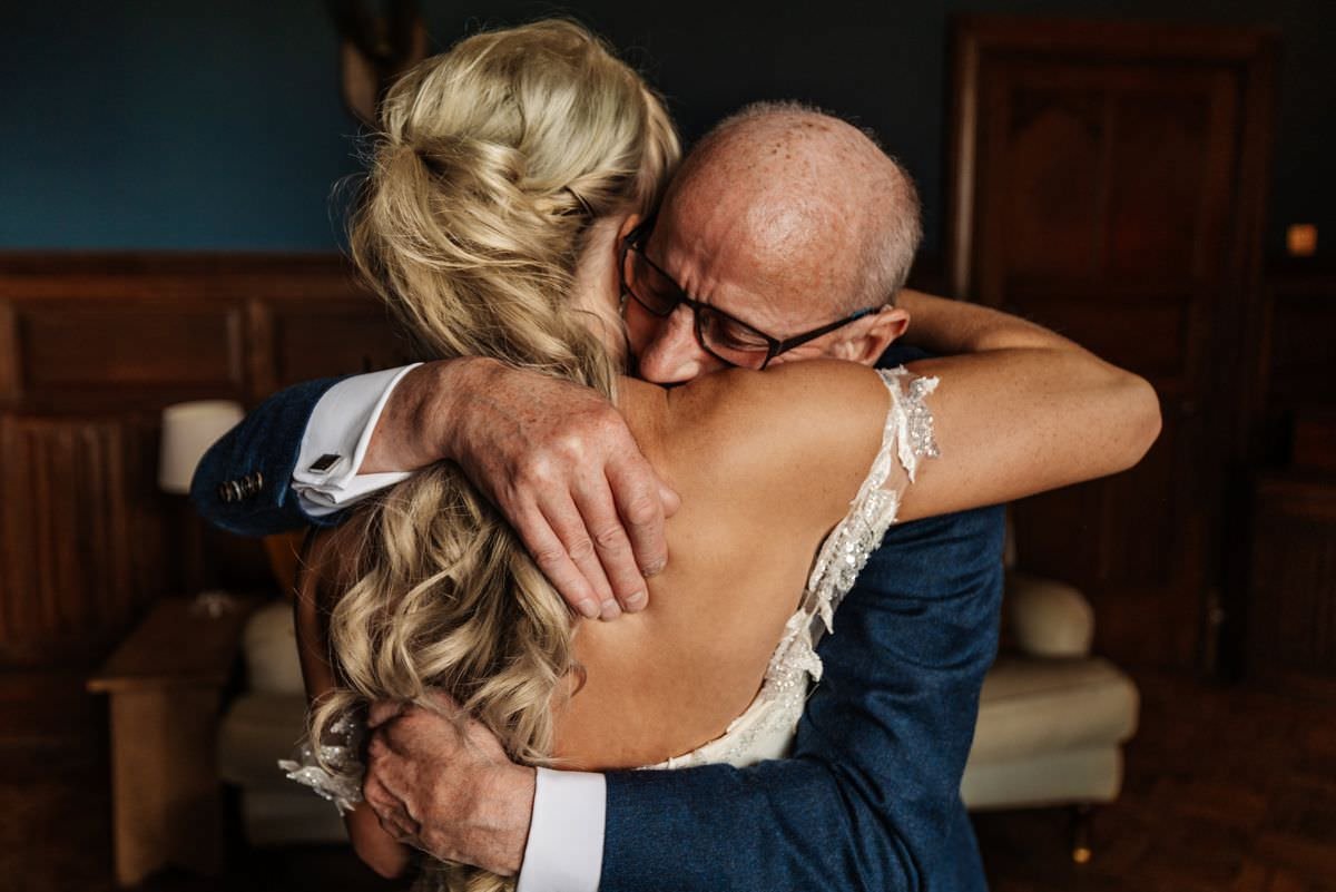 bride hugging dad wedding dress tears untagged 