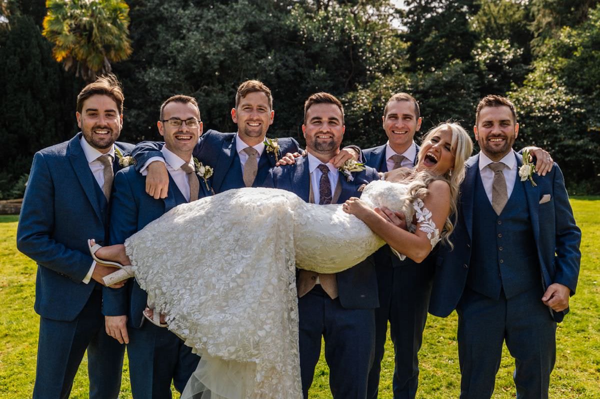 groomsmen groom holding the bride wyresdale park 