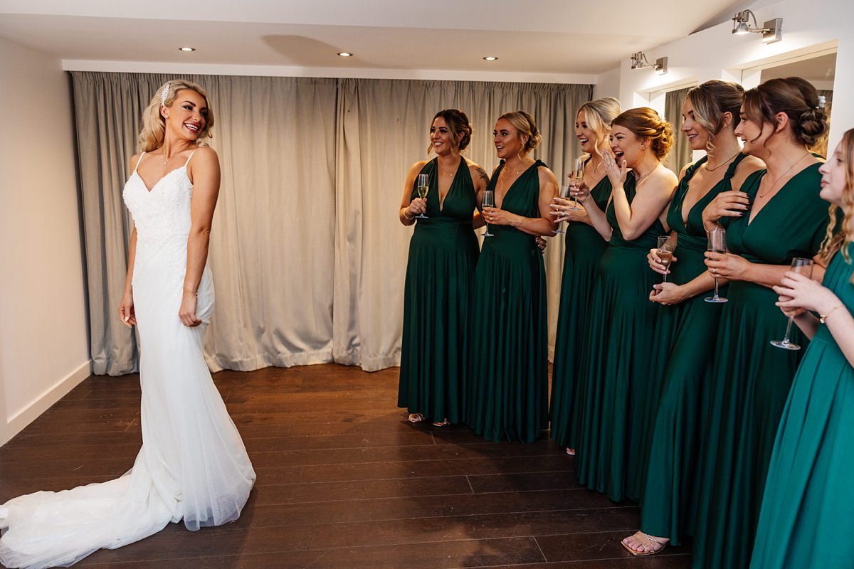 bride dress bridesmaids smiles laughter bashall barn wedding lancashire Ribble Valley