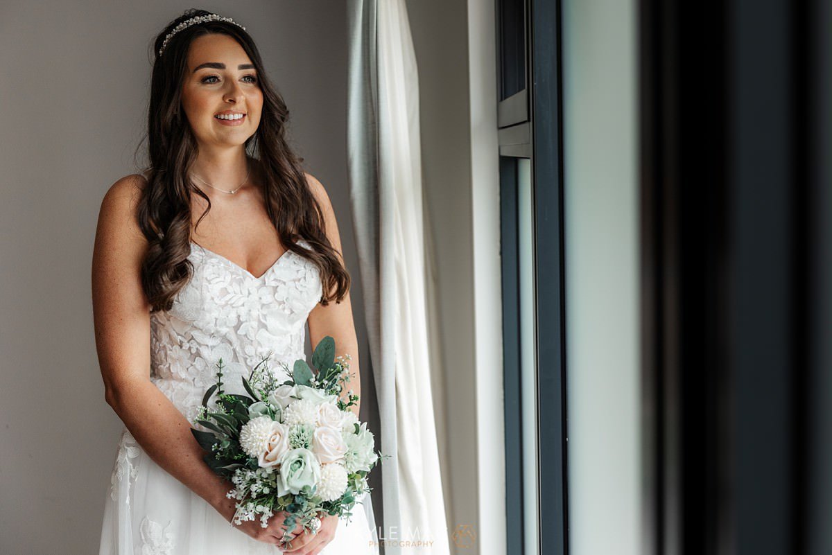 Bride portraits flowers bashall barn