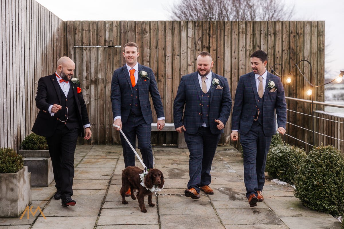 snow walk Bashall Barn winter wedding groom dog smiles portraits 