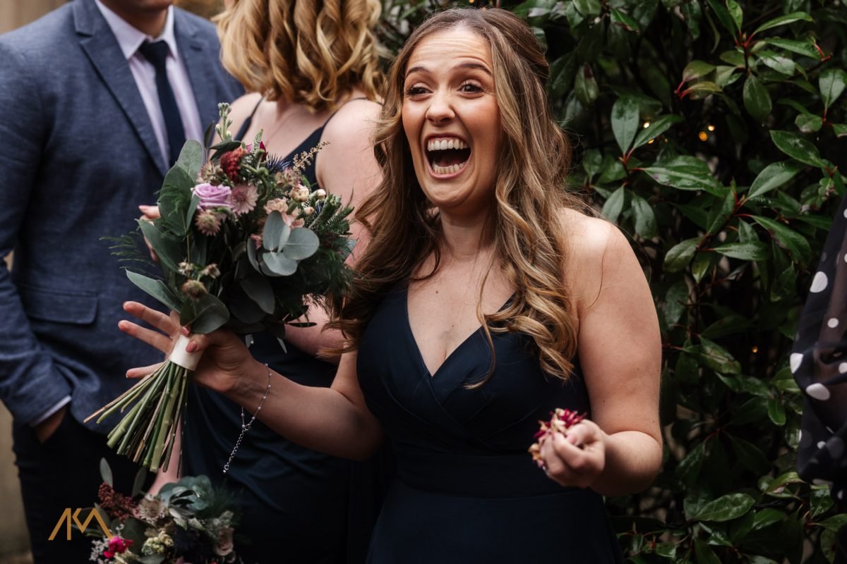 bridemsiads laughter Mitton Hall Winter Wedding