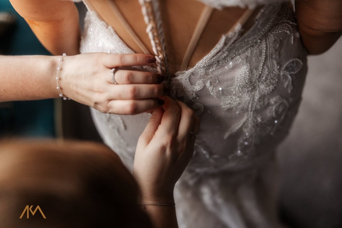 Mitton Hall Winter Wedding wedding dress details 