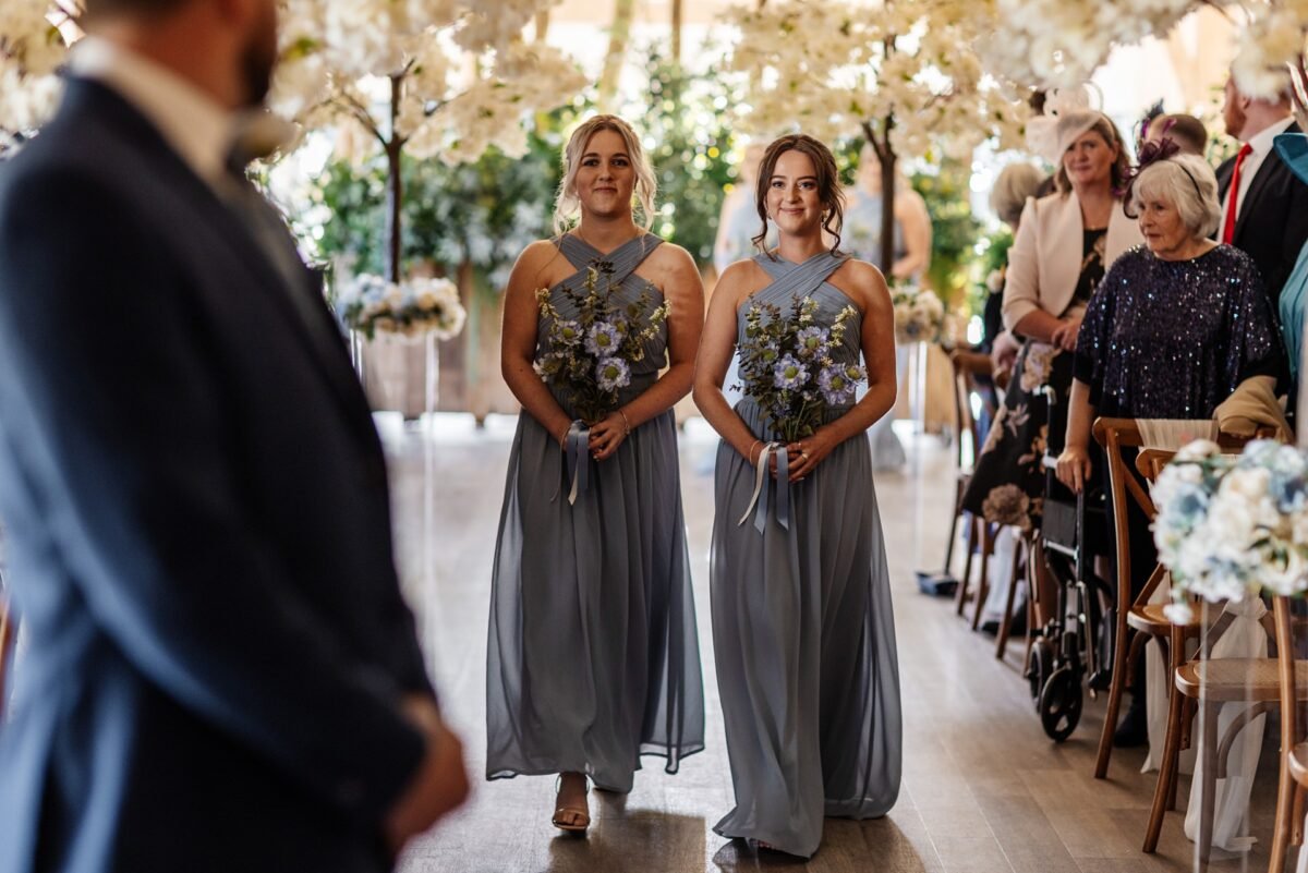 bridesmaids ceremony dress flowers