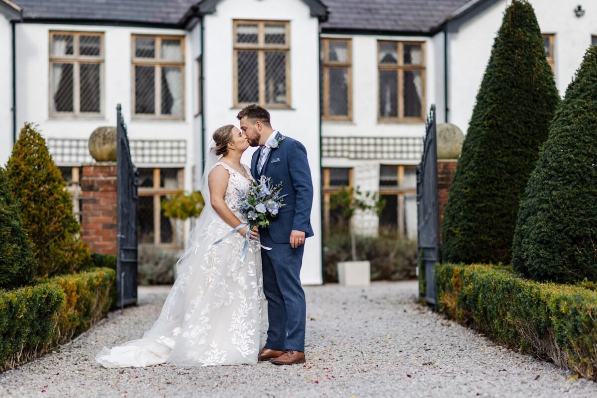 wedding portraits bride groom dress suits river barn