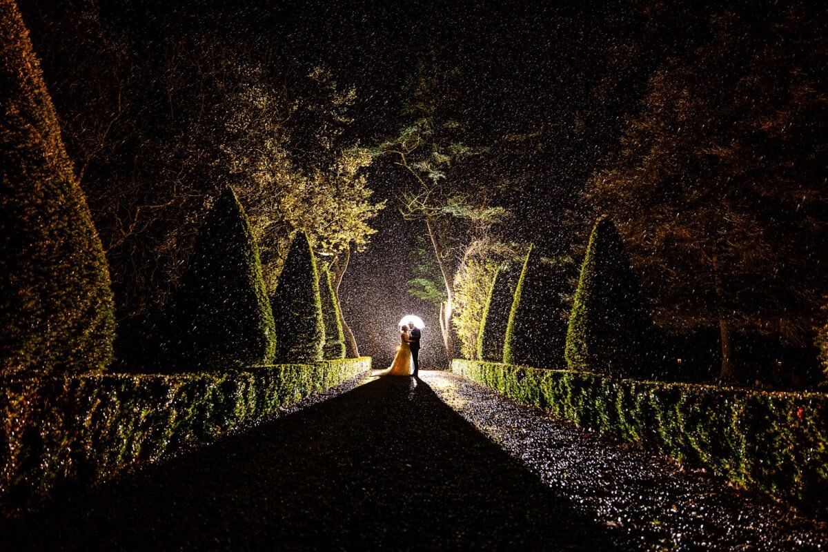 rain portraits river barn wedding bride groom