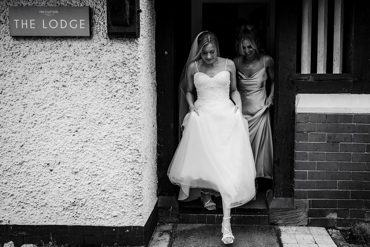entrance in to mere court hotel knutsford bride bridesmaids dress