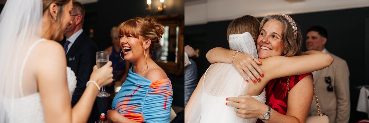 wedding guests hugging