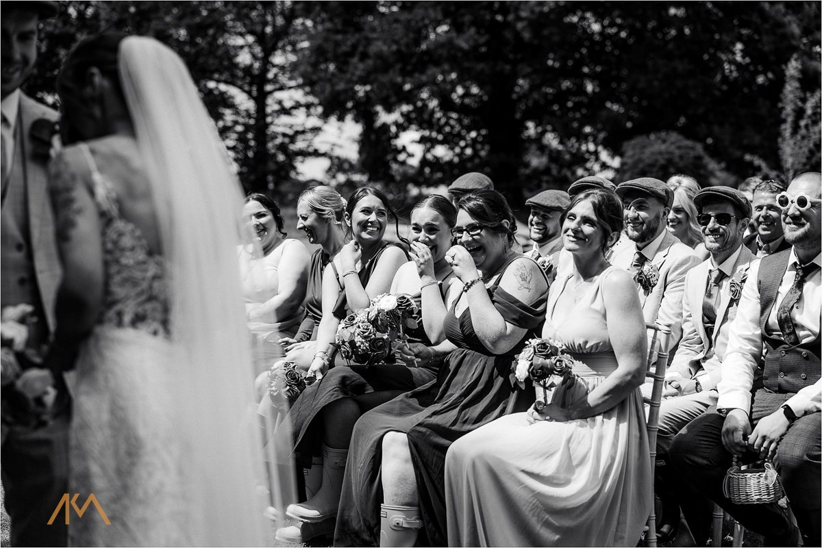 friends laughter Tipis at Riley Green ceremony