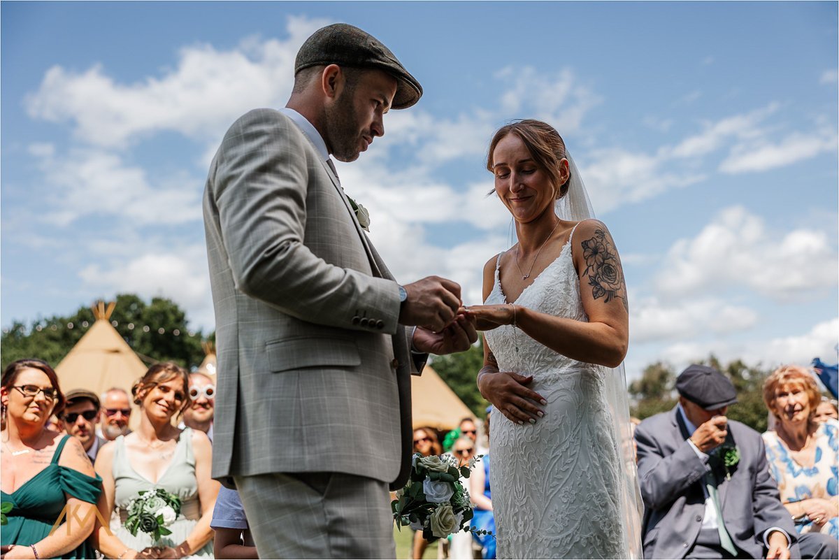 wedding rings Tipis at Riley Green ceremony