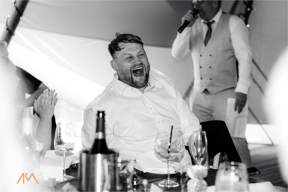 wedding guests laughing Tipis at Riley Green
