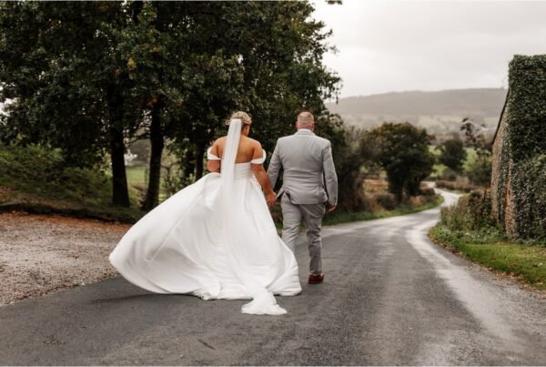 ribble valley bashall barn portraits bride dress windy autumn