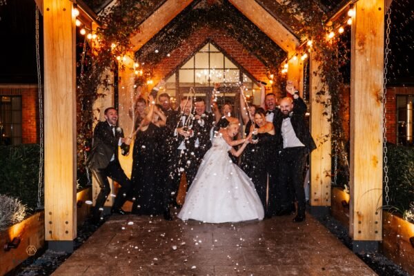 winter wedding bartle hall Champagne spray over guests