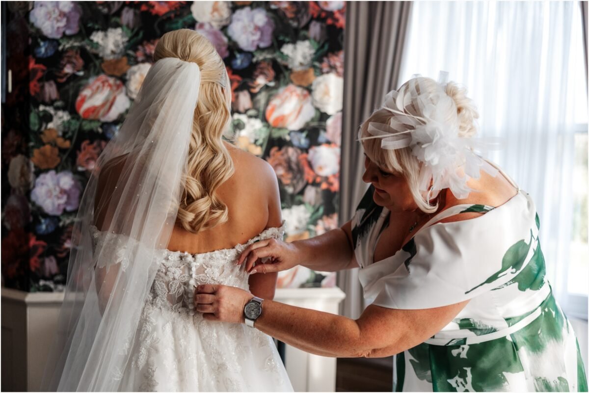 mum final touches dress wedding venue preston