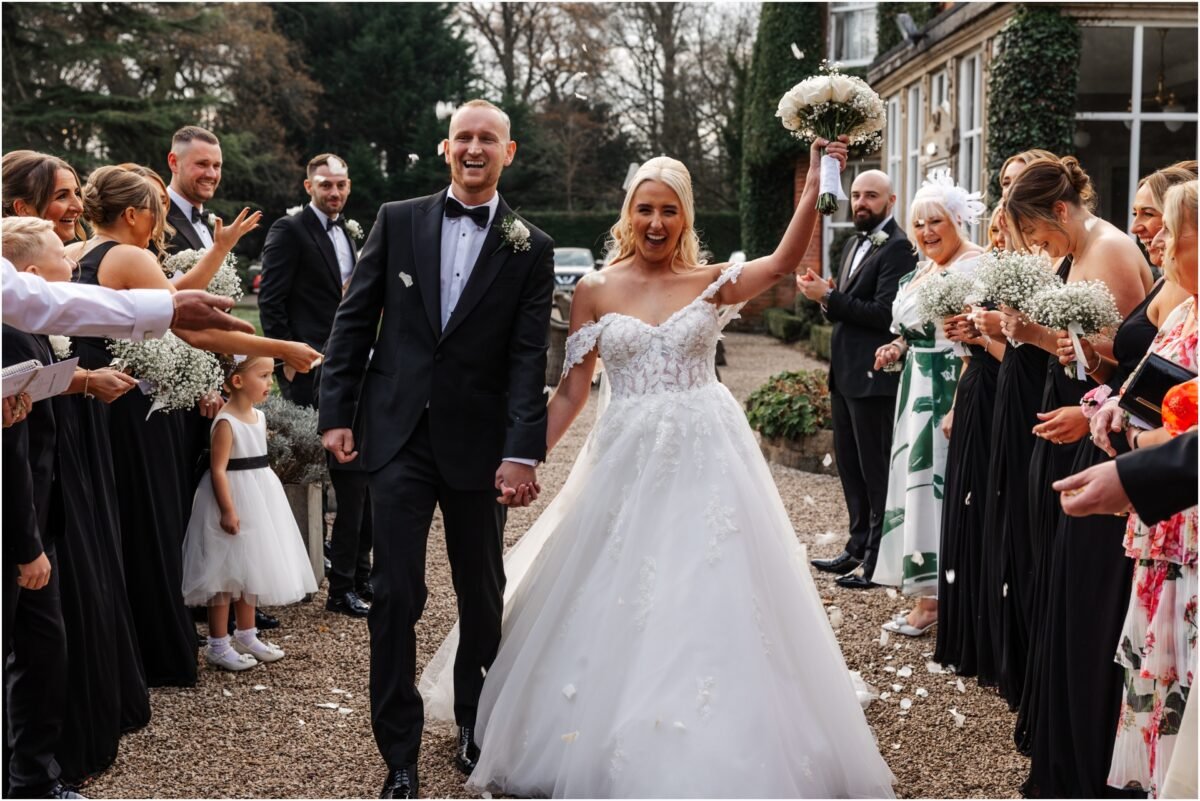 confetti bride groom wedding guests bartle hall garden winter