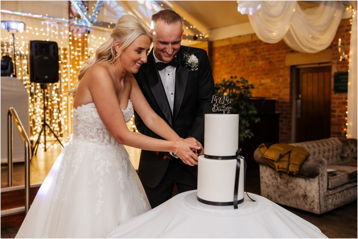 cutting the wedding cake bartle hall