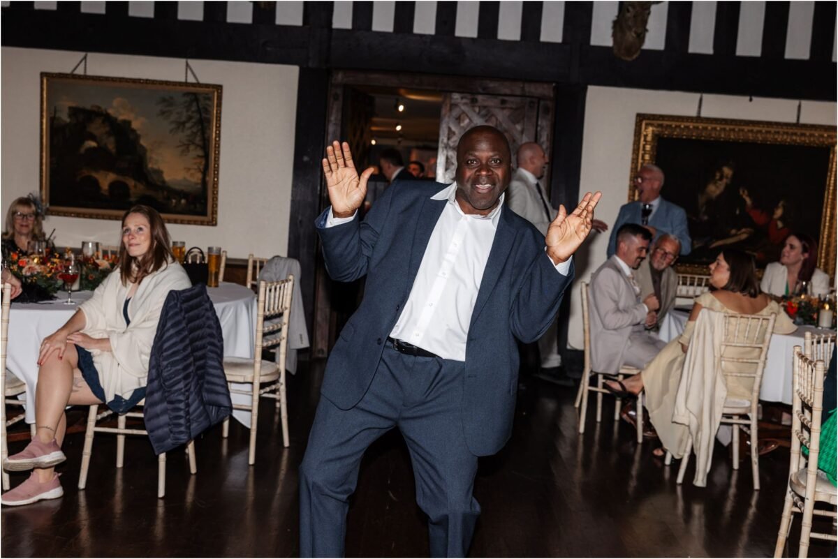 party wedding guests dancing celebrating Samlesbury Hall