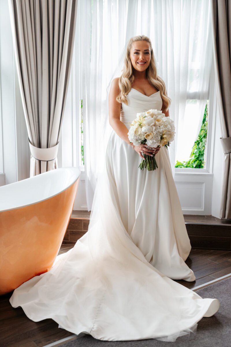 bride in wedding dress flowers 