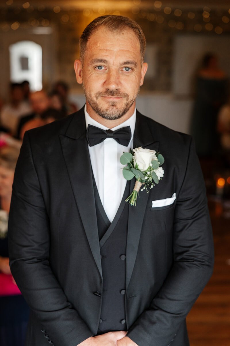groom suit black white rose flowers ceremony shireburn arms