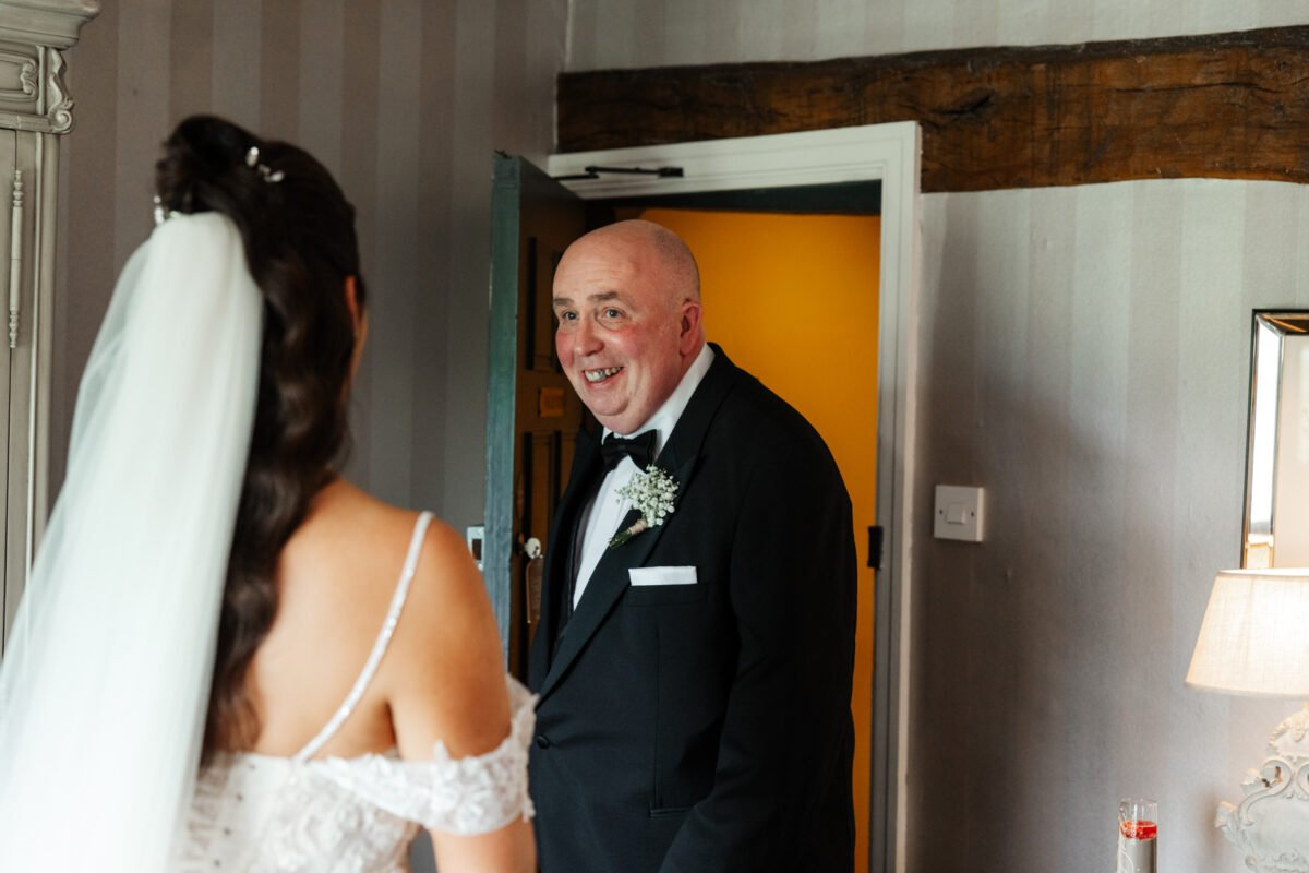 father of the bride hugs lancashire ribble valley wedding