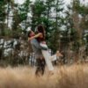 wedding portraits bride groom lifting feild ribble valley lancashire