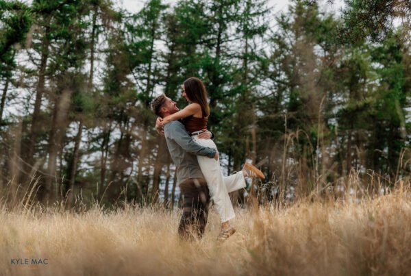 wedding portraits bride groom lifting feild ribble valley lancashire