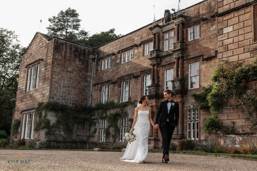 browsholme hall ribble valley wedding venue bride groom walking portraits