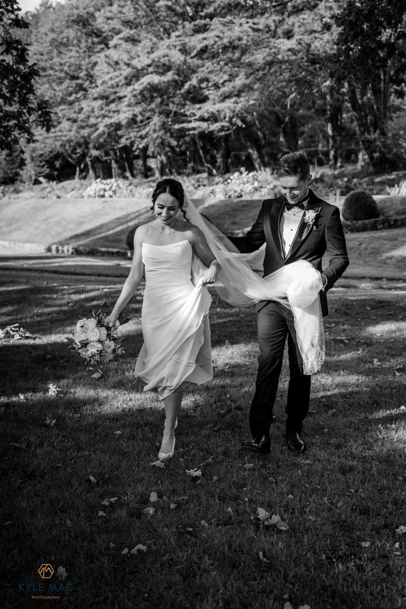 Romantic couple portrait with the old stone manor house behind, Ribble Valley